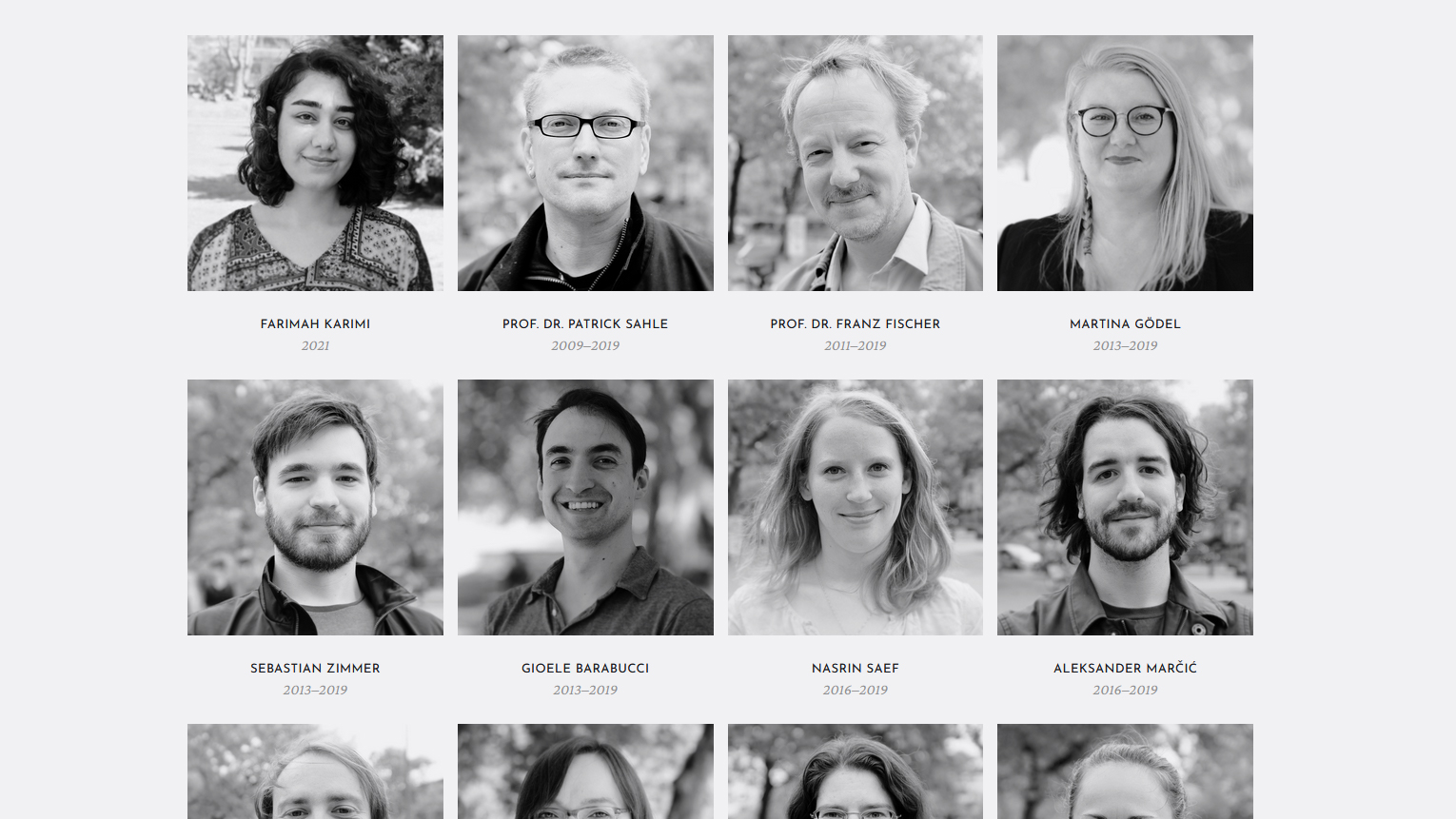 screenshot of the alumni/ae page with black-and-white photographs of former employees and associates