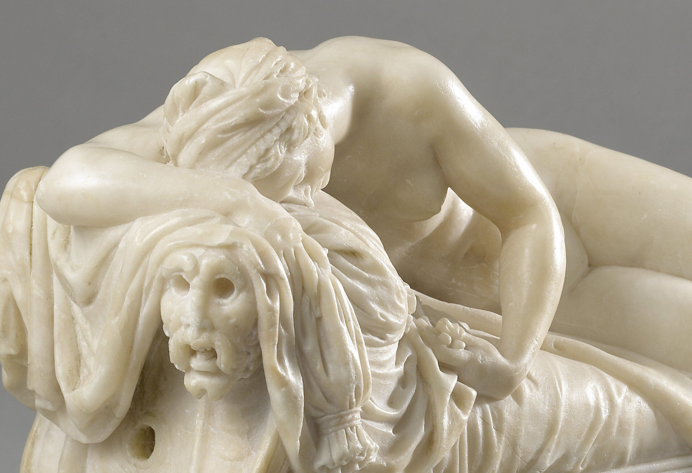 photograph of an alabaster sculpture depicting a woman (nymph) lying on a chaiselongue with her head resting on her arm; created around 1560 by Flemish sculptor van den Broecke, reminiscent of Michelangelo; Rijksmuseum Amsterdam, object number BK-1979-7, title of artwork: Sleeping Nymph